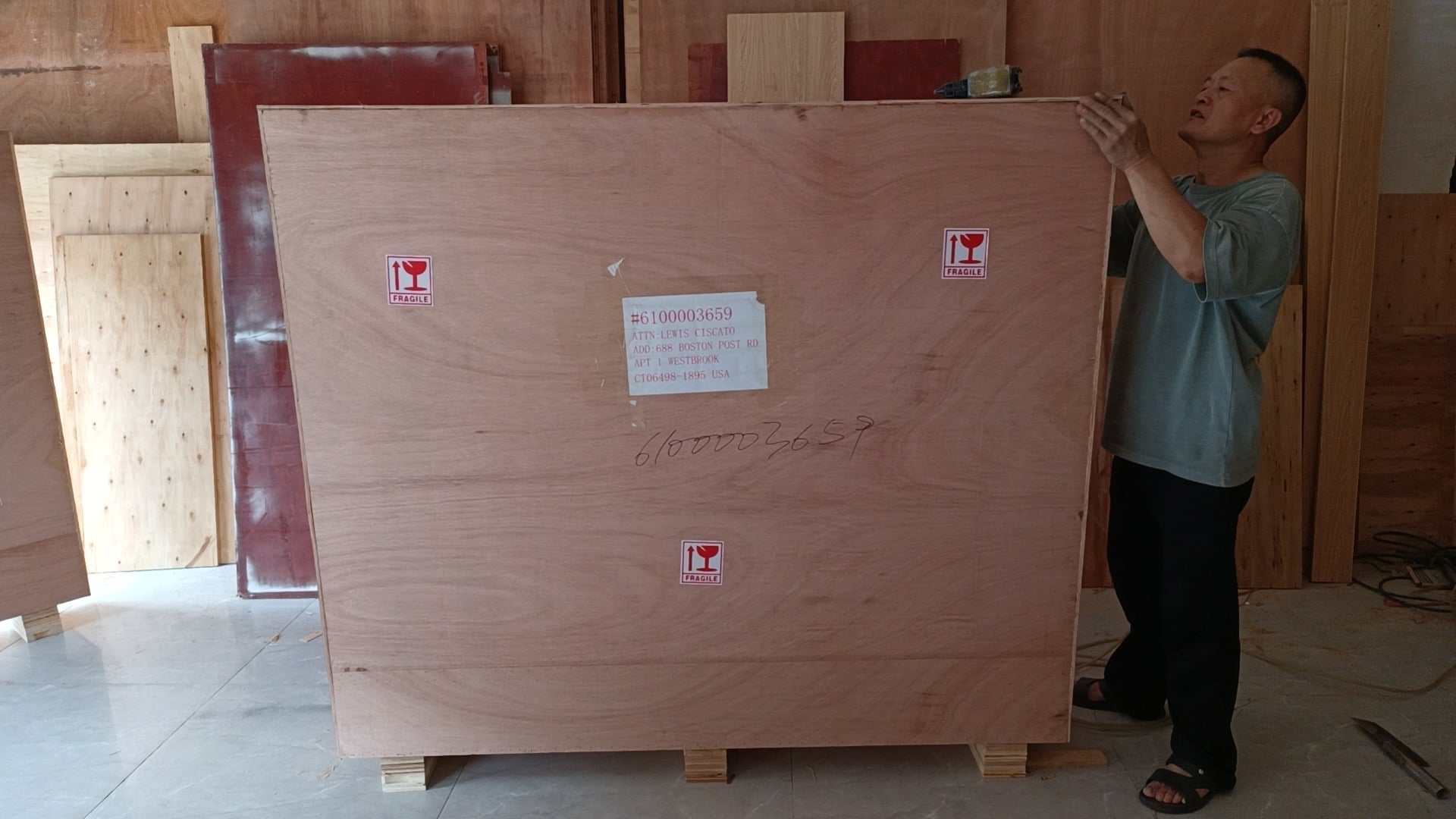 Large wooden crate packaging for Mustang Mach-E GT550 style carbon fiber hood with fragile labels