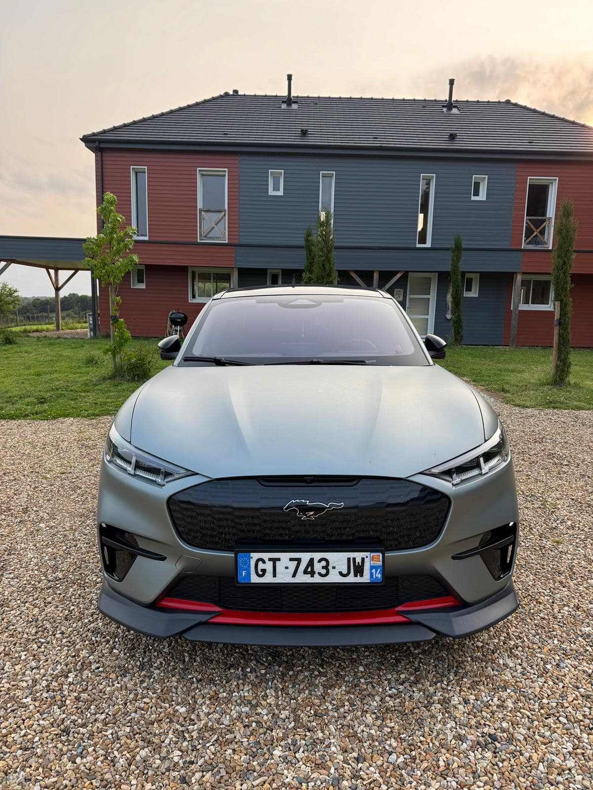 Front Lip Splitter installed on a grey Mustang Mach-E GT 2021-2025 with enhanced aerodynamics and sporty design