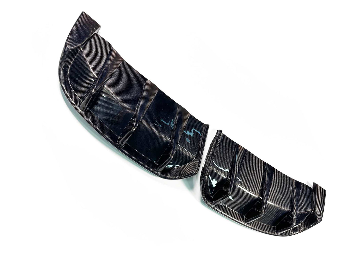 Rear diffuser for Mustang Mach-E made of high-quality wet carbon fiber in carbon black finish