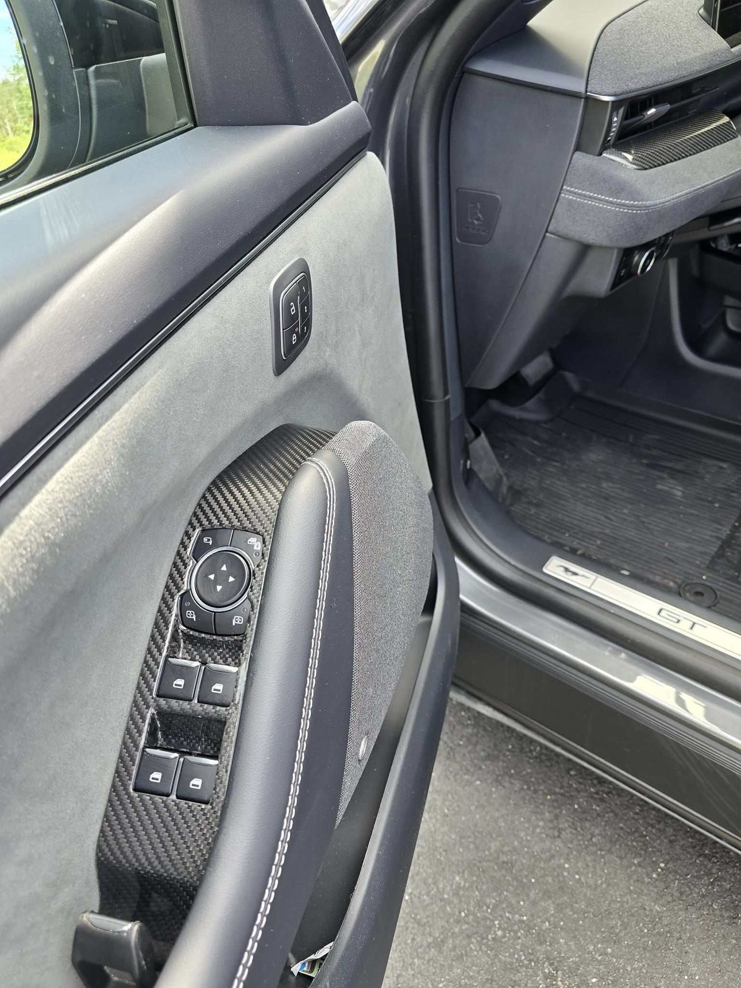 Mustang Mach-E door panel with dry carbon fiber window lifts cover installed