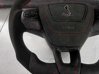 Custom made steering wheel for Mustang Mach-E with leather and Alcantara grips, flat-bottom design, and customizable features