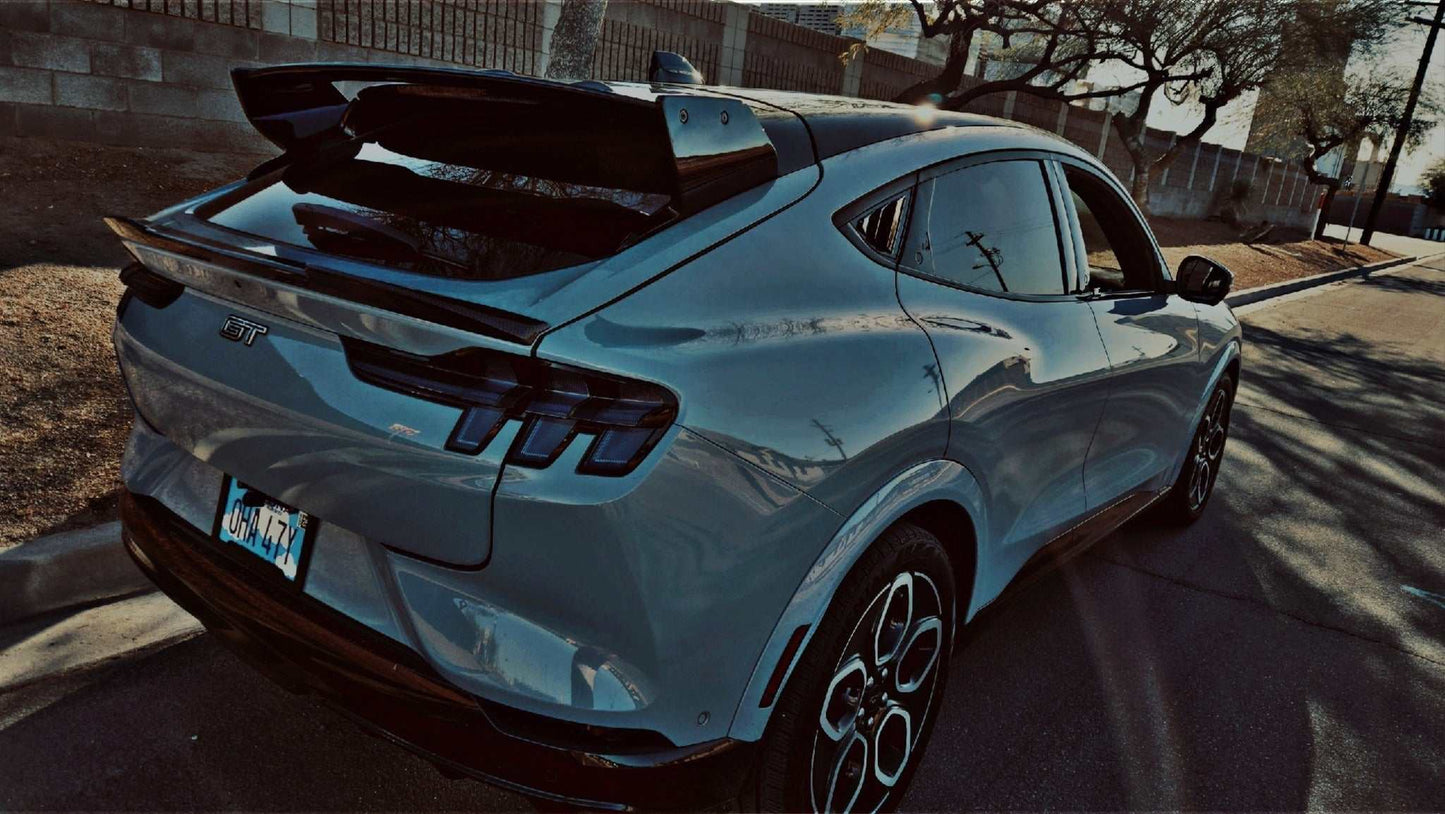 Rally Wing Spoiler on rear of blue Ford Mustang Mach-E enhancing aerodynamics and sporty look