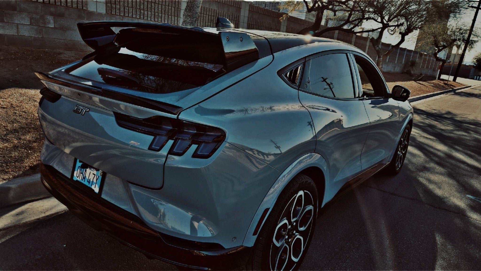 Rally Wing Spoiler on rear of blue Ford Mustang Mach-E enhancing aerodynamics and sporty look