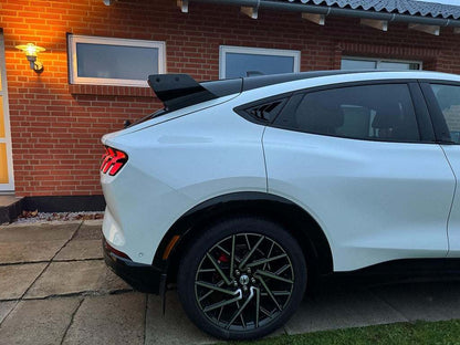 Rally Wing Spoiler on white Ford Mustang Mach-E rear side for improved aerodynamics and sporty look