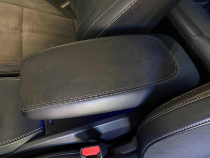 Custom-made armrest with Alcantara and leather, enhanced comfort, personalized stitching, and logo customization.